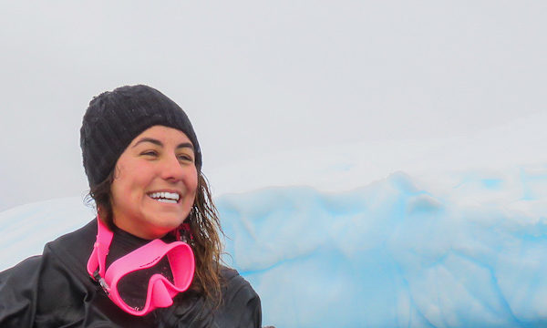 A woman sitting on a ship in Antarctica